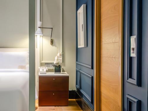 Katil atau katil-katil dalam bilik di Browns Central Hotel