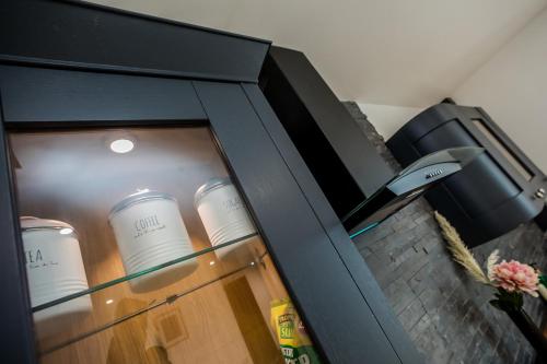 TV/trung tâm giải trí tại The Cosey Tucked-Away Cottage 2 or 3 bedroom options