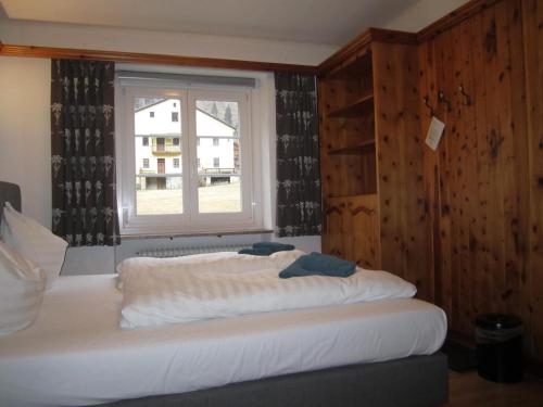 Ein Bett oder Betten in einem Zimmer der Unterkunft Gasthof Fair