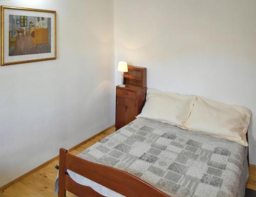 Katil atau katil-katil dalam bilik di Charming house in Jezera + Balcony