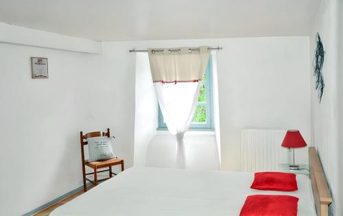 Ένα ή περισσότερα κρεβάτια σε δωμάτιο στο Maison confortable proche des pistes à Sainte-Marie de Campan