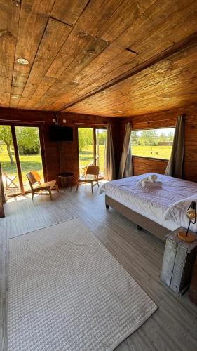 Ένα ή περισσότερα κρεβάτια σε δωμάτιο στο Hotel Chacra Bereshit