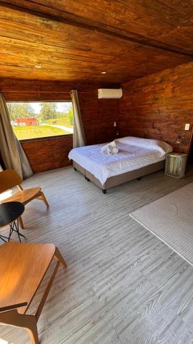Ένα ή περισσότερα κρεβάτια σε δωμάτιο στο Hotel Chacra Bereshit