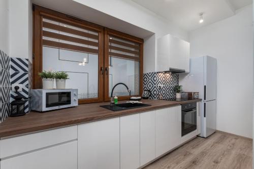 Dapur atau dapur kecil di Coco Premium Warszawa Radość