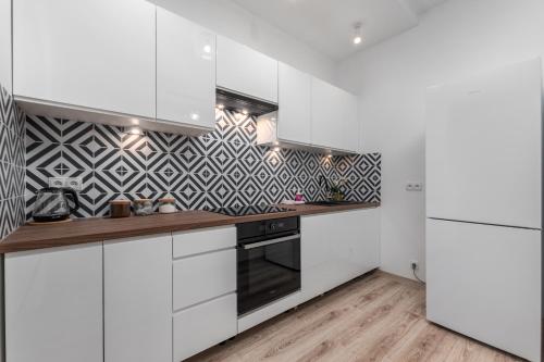 Dapur atau dapur kecil di Coco Premium Warszawa Radość