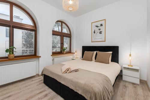 Katil atau katil-katil dalam bilik di Coco Premium Warszawa Radość