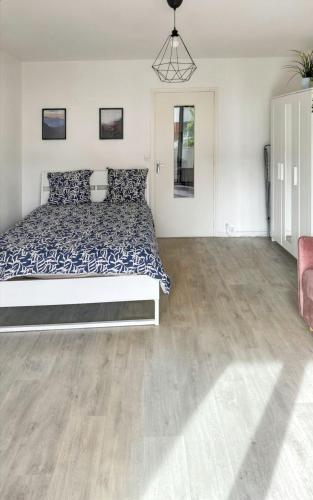 Katil atau katil-katil dalam bilik di Studio confortable proche Disneyland Paris, 34 m², balcon