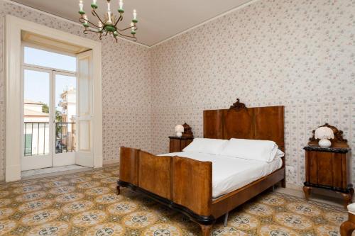 Postel nebo postele na pokoji v ubytování Sorrento Central Flats