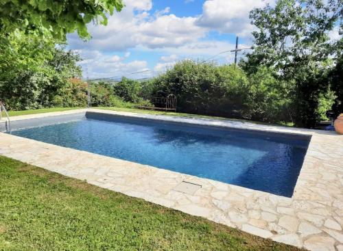 Bazén v ubytování Cozy apartment with pool in Trequanda 40 m² nebo v jeho okolí