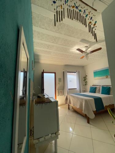 Postel nebo postele na pokoji v ubytování Suites Casa Azul-Vila do Abraão- conforto, limpeza, ótima localização