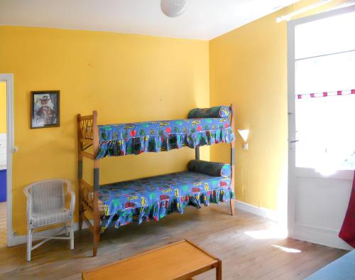 Postel nebo postele na pokoji v ubytování Maison charmante à Soulac-sur-Mer avec jardin clôturé