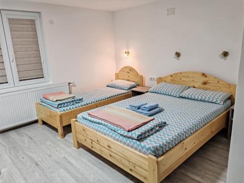 Ένα ή περισσότερα κρεβάτια σε δωμάτιο στο Studio sa francuskim i pomoćnim ležajem - Romansa