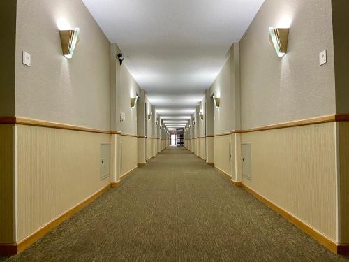 an empty hallway in an office building at FairBridge Inn & Suites Fort Wayne in Fort Wayne