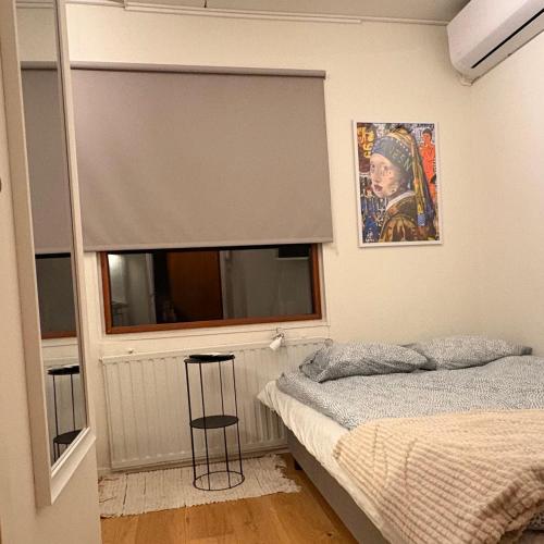 Postel nebo postele na pokoji v ubytování Lilla Strandis