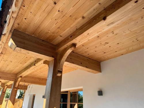 a wooden ceiling on a house with a porch at Ferienwohnung am Nettenbach in Bernau im Schwarzwald