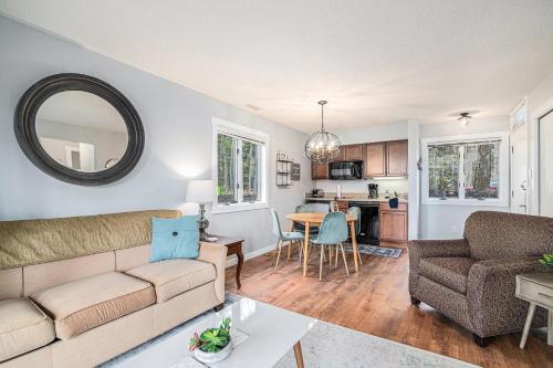 a living room with a couch and a table at The Shores in Williamsburg