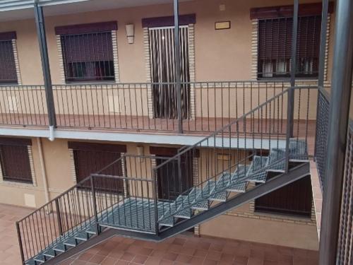 a staircase in the side of a building at Águila Real in Arroyo Frio