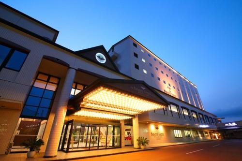 a building with a clock on the front of it at The Paradise Garden Sasebo - Vacation STAY 03127v in Sasebo