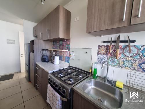 Kuchyň nebo kuchyňský kout v ubytování Departamento Corporativo I Talca Norte - RENTCOVAC - Factura Inmediata