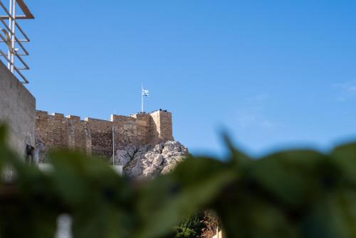 a view of the wall of gibraltar at Central House in Plaka in Athens
