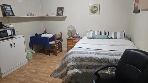 Postel nebo postele na pokoji v ubytování Vermaurel Sweet Lodge