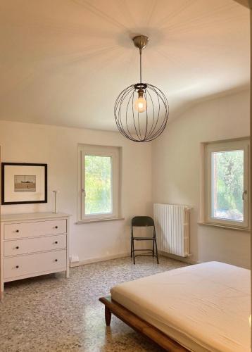 Postel nebo postele na pokoji v ubytování Microfattoria Lenta