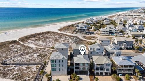 an aerial view of a beach with houses and the ocean at Grayt Digs by AvantStay Next to Beach Oceanview in Santa Rosa Beach