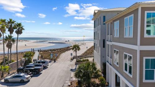 a view of the beach from the balcony of a condo at Grayt Digs by AvantStay Next to Beach Oceanview in Santa Rosa Beach