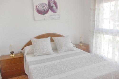 Katil atau katil-katil dalam bilik di Spacious Apartment in Sant Carles de la Ràpita, Sea View