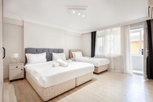 Postel nebo postele na pokoji v ubytování Charming Spacious 4 Big rooms with Sweet king beds