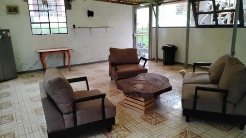 Un lugar para sentarse en Granja Triple A