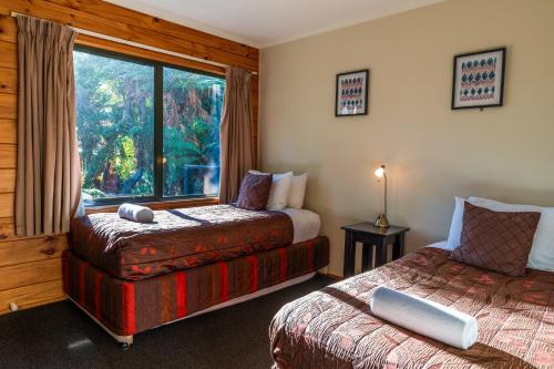 Rainforest Retreatにあるベッド