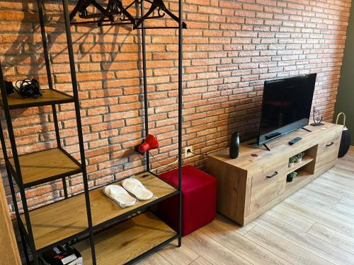 Televisyen dan/atau pusat hiburan di Mickitos Cozy Studio Two