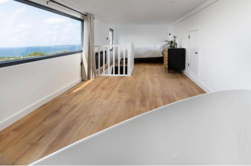 Postel nebo postele na pokoji v ubytování Lulla Lodge