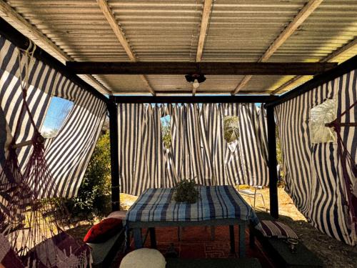 a inside of a yurt with a table in it at Biodiversidad in La Pedrera