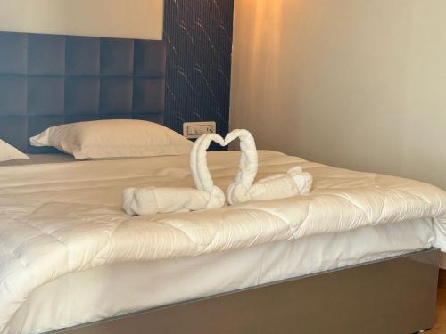 Ένα ή περισσότερα κρεβάτια σε δωμάτιο στο Aliaras Homestay