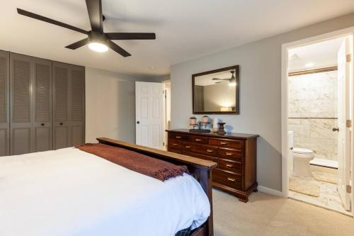 a bedroom with a bed and a ceiling fan at Liberty Call in Arnold
