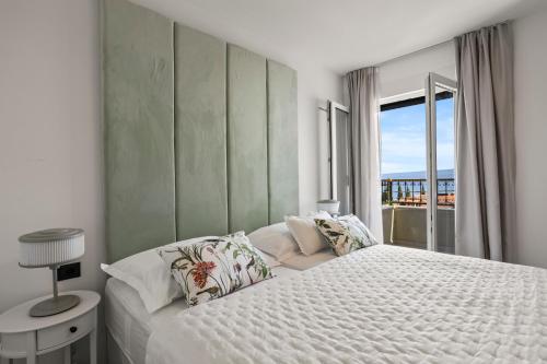 Posteľ alebo postele v izbe v ubytovaní Luxury Penthouse Duce