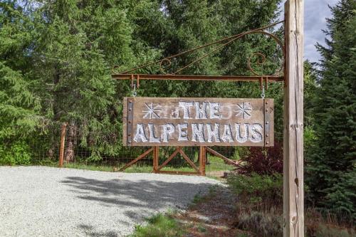 a sign that says the entrance to an airplane park at The Alpenhaus in Packwood