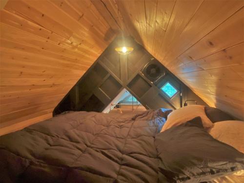 Katil atau katil-katil dalam bilik di Ohana Cabin