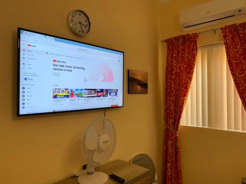 Cloud 9 Residenceにあるテレビまたはエンターテインメントセンター