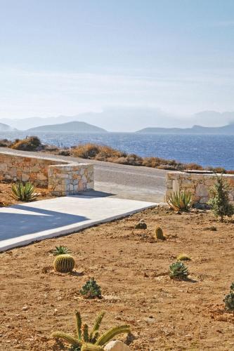a path in the desert with a view of the ocean at Agave Donousa Suites in Donoussa