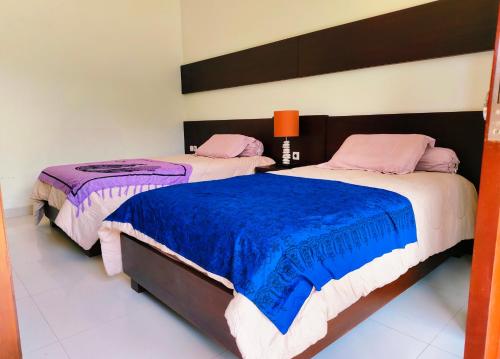 Ένα ή περισσότερα κρεβάτια σε δωμάτιο στο Ocean View Large 5 Bedroom Villa