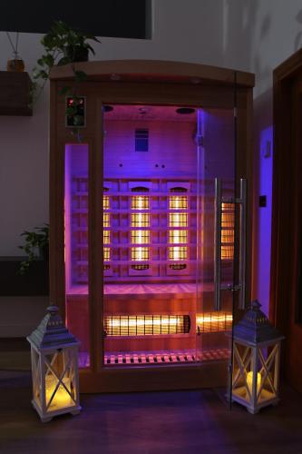a large room with purple lights in a room at Residenza Noè in Antica Villa - Suite & Spa in Fisciano