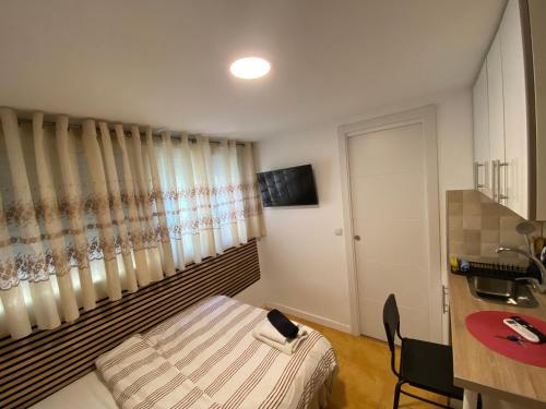Habitaciones estudios con cocina y baño privado de temporada Instancias largas Long Stay desde 11 noches