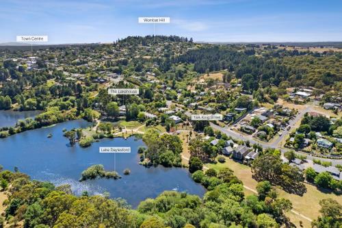 an aerial view of a town with a lake at Romantic Lakefront Luxury - Spa Bath, Fireplace, King Bed in Daylesford