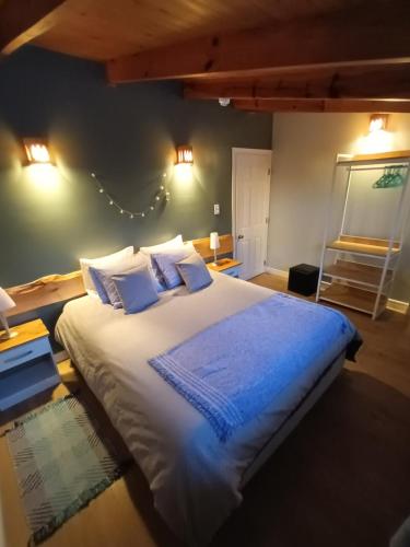 Postel nebo postele na pokoji v ubytování Buenavida Guesthouse
