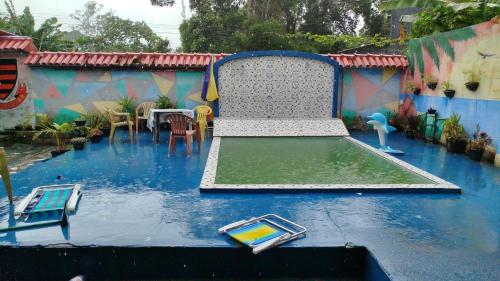 Bazén v ubytování Hospedagem Casa grande nebo v jeho okolí