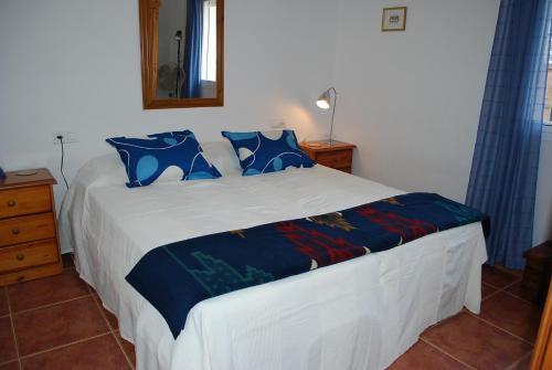 Tempat tidur dalam kamar di Casa Lake Viñuela