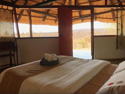 Giường trong phòng chung tại River Range Camp